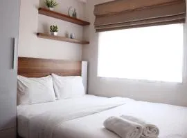Comfy 2BR Apartment at Grand Asia Afrika By Travelio