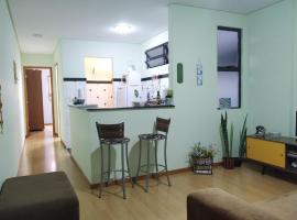 Apartamento quarto e sala em frente UFV com WI-FI e Garagem, sewaan penginapan di Viçosa