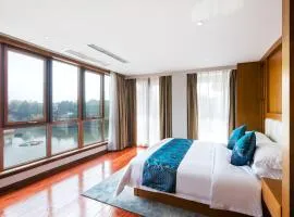 Floral Hotel · Yingxi Riverside Deqing
