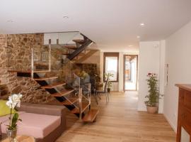 Casa Brétema en 1ª línea de playa, hotel in Boiro