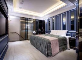 OUGE Motel - Fengshan, hotel con bañera de hidromasaje en Kaohsiung