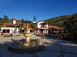 Hacienda Buenos Aires en Iza, cabaña o casa de campo en Iza