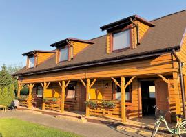 Domy Wypoczynkowe Siedlisko, hotel em Sarbinowo