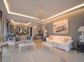 Epavlis Luxury apts、レプトカリヤのキッチン付きホテル