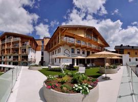 Almfamilyhotel Scherer, hotell med basseng i Obertilliach