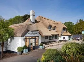 The Potters Heron - A Heartwood Inn
