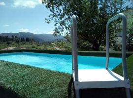 Suite Bobo relax nel chianti classico gallo nero, hotel amb jacuzzi a Strada