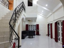 OMG Guesthouse Room for 6, nhà nghỉ dưỡng ở Licup