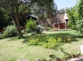 Stintino casa con giardino vicino la Pelosa, hôtel à Stintino