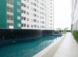 RedDoorz Apartment near Bundaran Satelit Surabaya, alojamento para férias em Surabaia