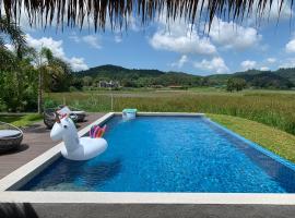 Cloud9 Holiday Cottages, holiday home in Pantai Cenang