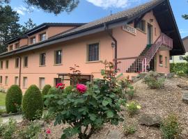 Motel des fleurs, hotel amb aparcament a Servion