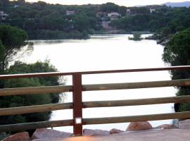 LAS CABAÑAS DEL LAGO más pase piscina las 2 columnas Del 1 junio 2026 al 30 agosto 2026, hotell i Córdoba
