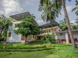 OYO 39552 Visawa Beach Resort, hotel in Dāhānu