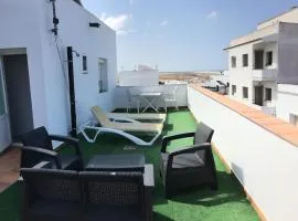 Arco - Virgen Apartamentos y Habitación