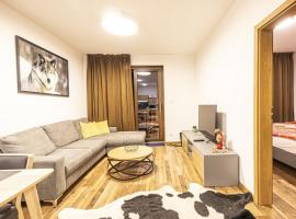 Apartmánový dom Poludnica - Chopok Juh, casă de vacanță din Tale