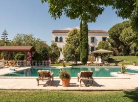 Hacienda las tres niñas, hotel ramah hewan peliharaan di La Puebla del Río