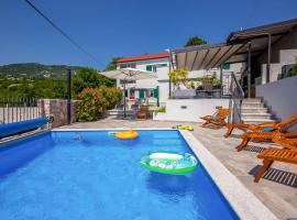Villa LETA, luxurious 5 stars villa in a green oasis with fitness, heated pool, playground & barbecue, Kvarner, villa in Hreljin