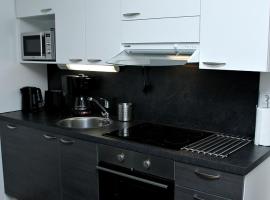 Kotimaailma Apartments Joensuu - Koulukatu 21, παραθεριστική κατοικία σε Joensuu