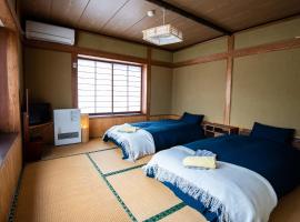 Toemu Nozawa Lodge, Jaapani võõrastemaja sihtkohas Nozawa Onsen