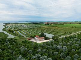 Agriturismo Valle Ca' del Lovo แกลมปิ้งในCarlino