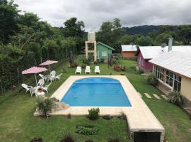 Cabañas en la Naturaleza con pileta y jardín - Vaqueros, hotel Vaquerosban