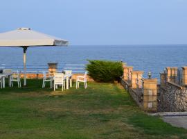 Alexandros Apartments , Beachfront Retreat near Petalidi with Private Sunbeds & Sea View