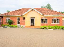 Palm Hotel, hótel í Mbale