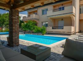 Apartments Juric, hotel di Rab