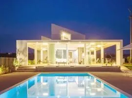 Villa Arillà con piscina e padel