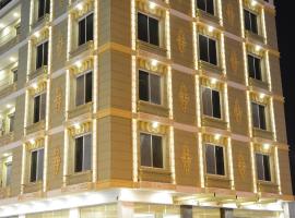 E1 Hotel, viešbutis mieste Al Charža