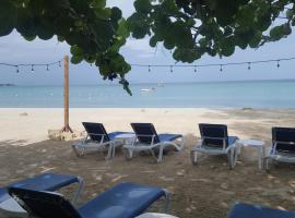 Firefly Beach Cottages, hotell i Negril
