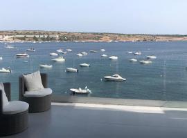 Mellieha Bay Waters Edge No. 160, hotel perto de Parque Temático Popeye Village, Mellieħa