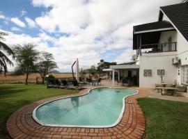 Dusk to Dawn Guesthouse, hotel in Piet Retief