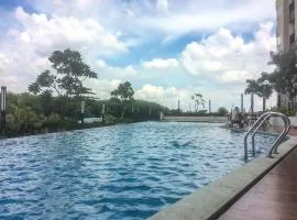 Homey Studio at The Oasis Cikarang Apartment By Travelio