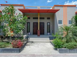 RedDoorz near Taman Makam Pahlawan Tatura, hotel di Palu