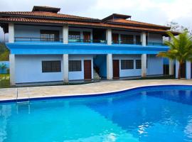 Chalés individuais com piscina a 500M da praia, помешкання для відпустки у місті Mocoóca