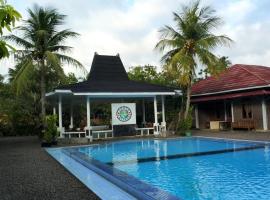 Lucia Cottages, hotell i Sukarame