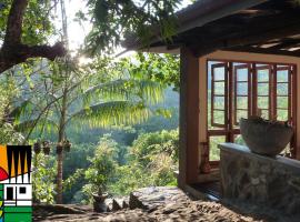 Singharaja Garden AGRO ECO Lodge、Pelawattaのコテージ