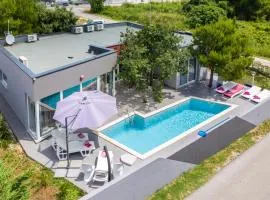 Modern villa Jura with pool near the beach, extra pool heating available