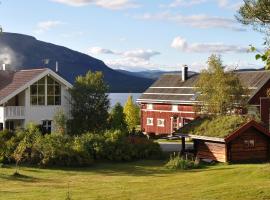 Fossumsanden Camping og Hytter، مكان تخييم فخم في Fyresdal