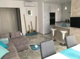 Luminoso apartamento en playa las redes, entorno natural pinares y dunas. Wifi