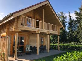 Boomstamhuis High Chaparral, camping resort en Oirsbeek