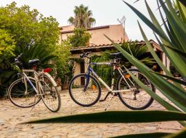 Alghero in bicicletta: Alghero şehrinde bir aile oteli