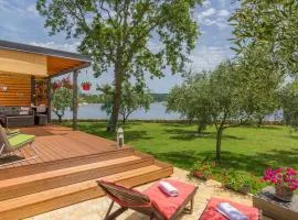 Beach house IVE with jacuzzi, pool, playground and bbq in an olive grove with a beach, Pomer - Istria