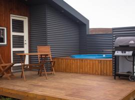 Einishus Cottages, hotell i Laugar