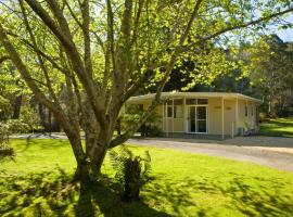 Russell Falls Holiday Cottages, familiehotel i National Park