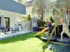 Flamind Holiday Apartments mit Garten und Grill