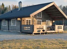 Ferienhaus Stenbäcken in Mittelschweden, hotell med parkeringsplass i Töcksfors