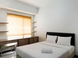 Simply Furnished Studio Apartment at Scientia Residence By Travelio